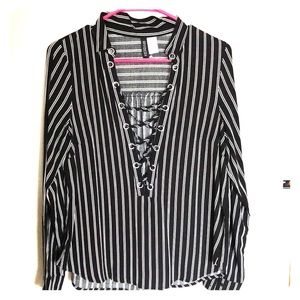Black and white, striped, tie-up blouse. Size 6.